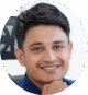 vecteezy_casual-indian-business-man-working-on-desktop-computer_12429394